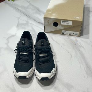 On Running Black and White Sneakers